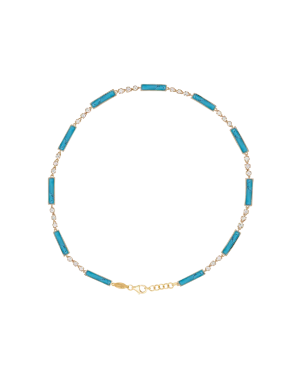 DI ACQUA Blue necklace Yellow gold set with brilliant cut natural diamonds, and natural cut Fairuz stones.